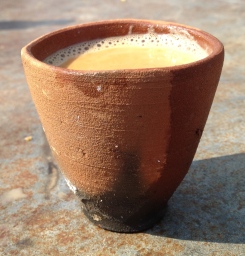chai in pottery cup