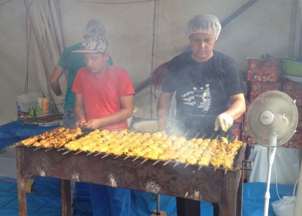 cooking Iranian chicken kebabs