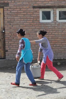 Carrying milk, Kyrgyzstan