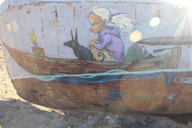 Girl and dog on boat, Olkhon Island