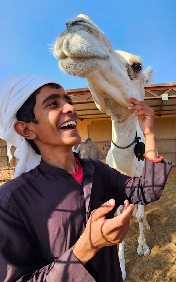 Young man with camel